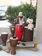 Man playing bongos at event